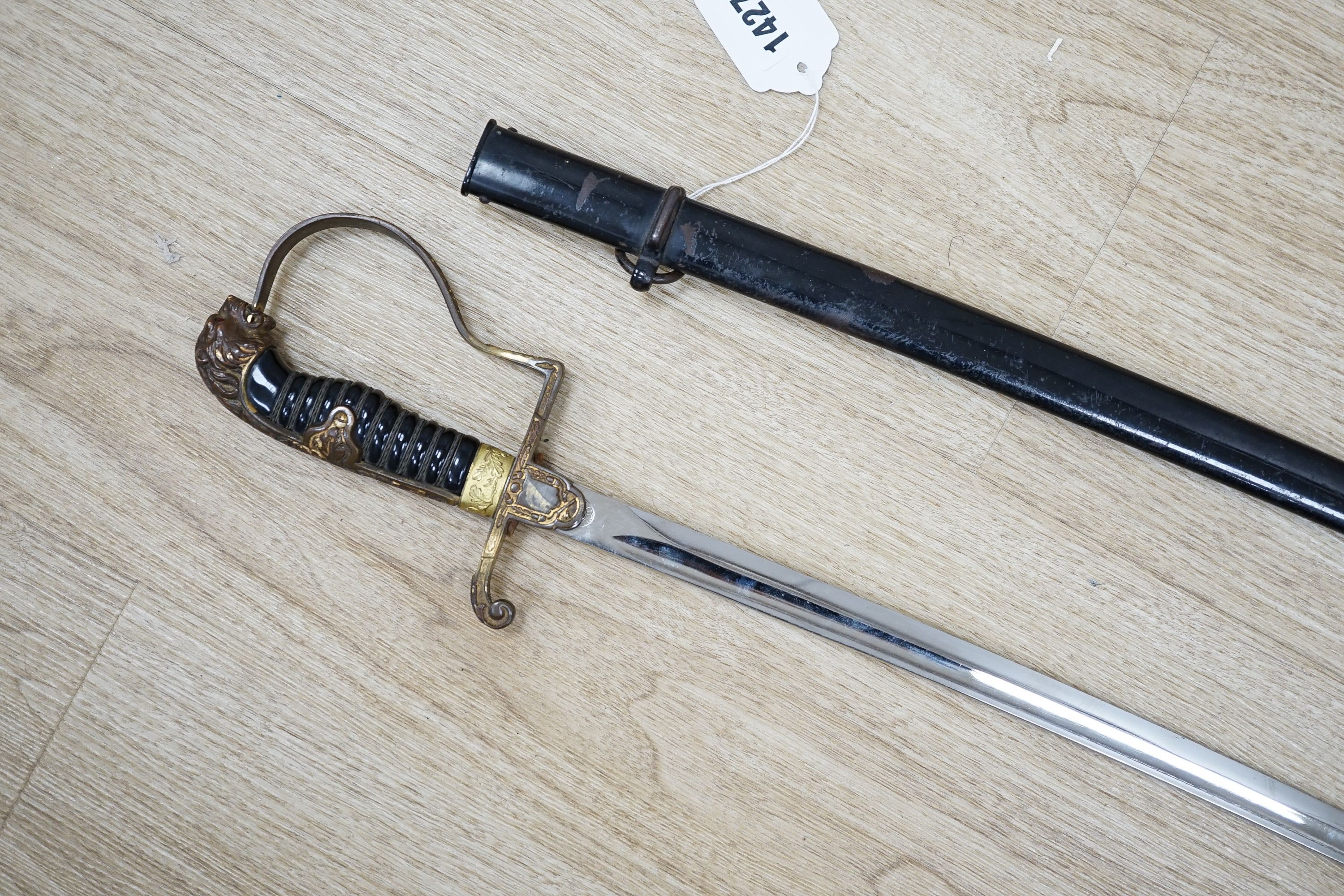A German cavalry dress sword, provenance Desert Rats, length 102cm